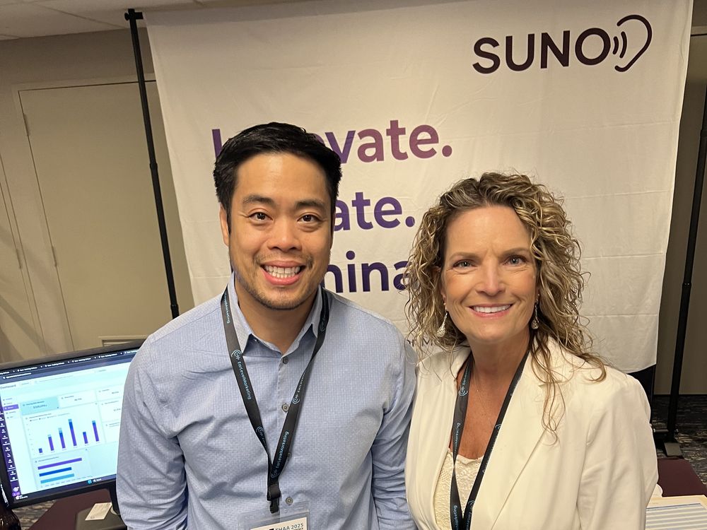 The Suno booth on a conference floor